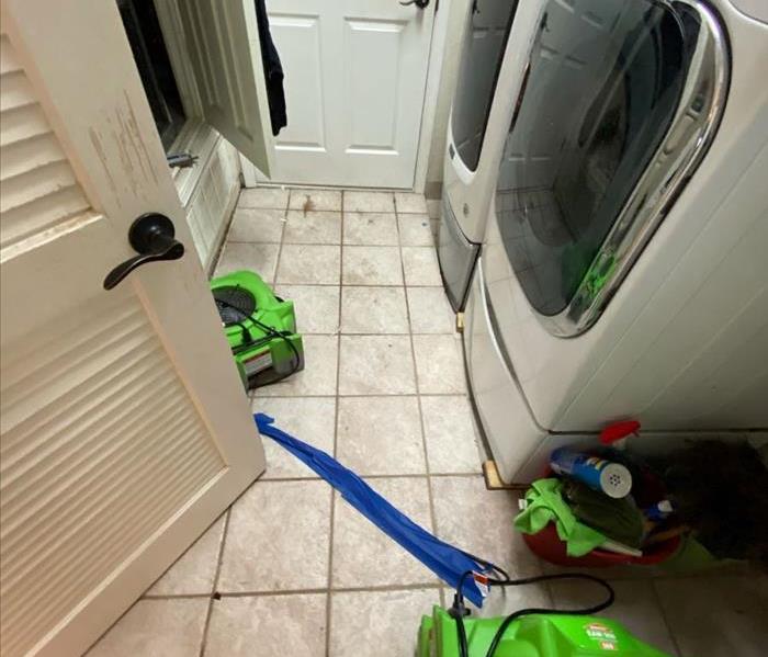 washing machine and dryer with fan on the floor